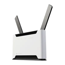 MIKROTIK Wireless Router DualBand, 4x1000Mbps+ 1x2,5Gbps, Chateau LTE18, 1xMicroSIM,Asztali -S53UG + 5HaxD2HaxD-TC&EG18-EA